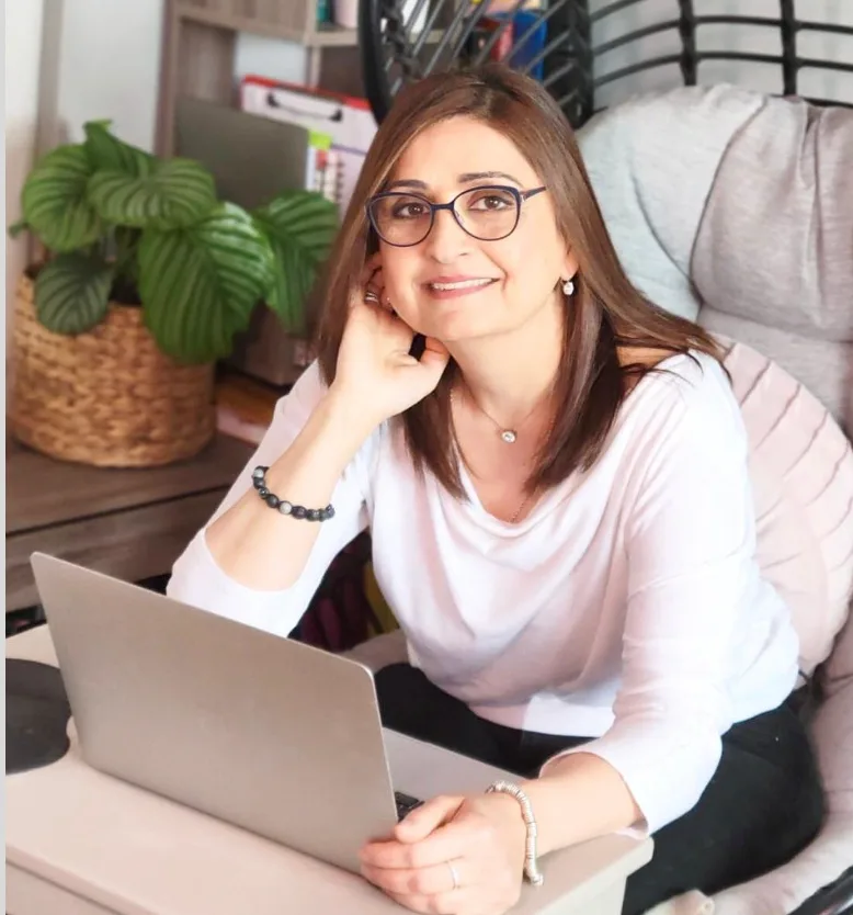 Marjan Emami at her desk